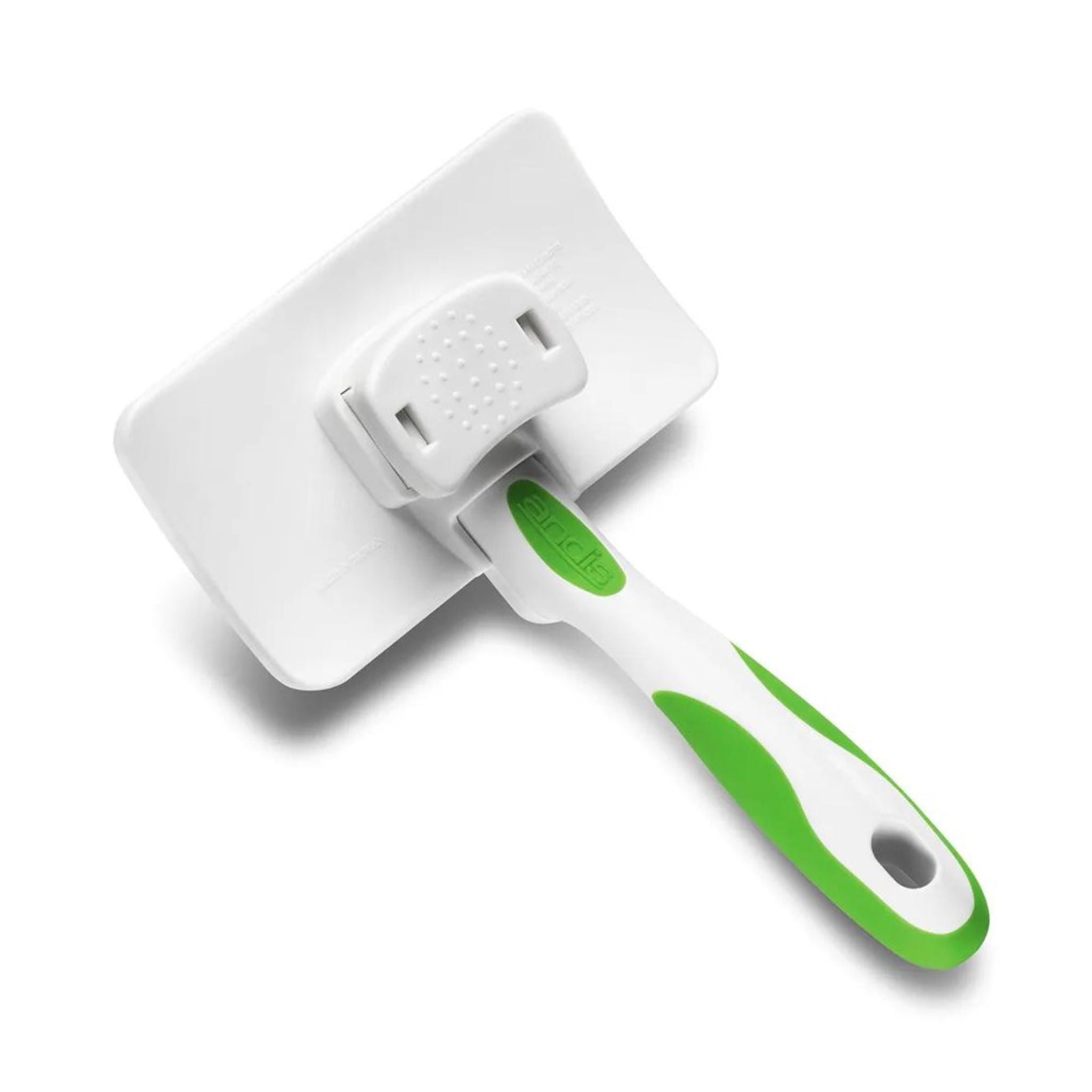 Angled view of the Andis Self-Cleaning Slicker Brush, highlighting the self-clean button design.