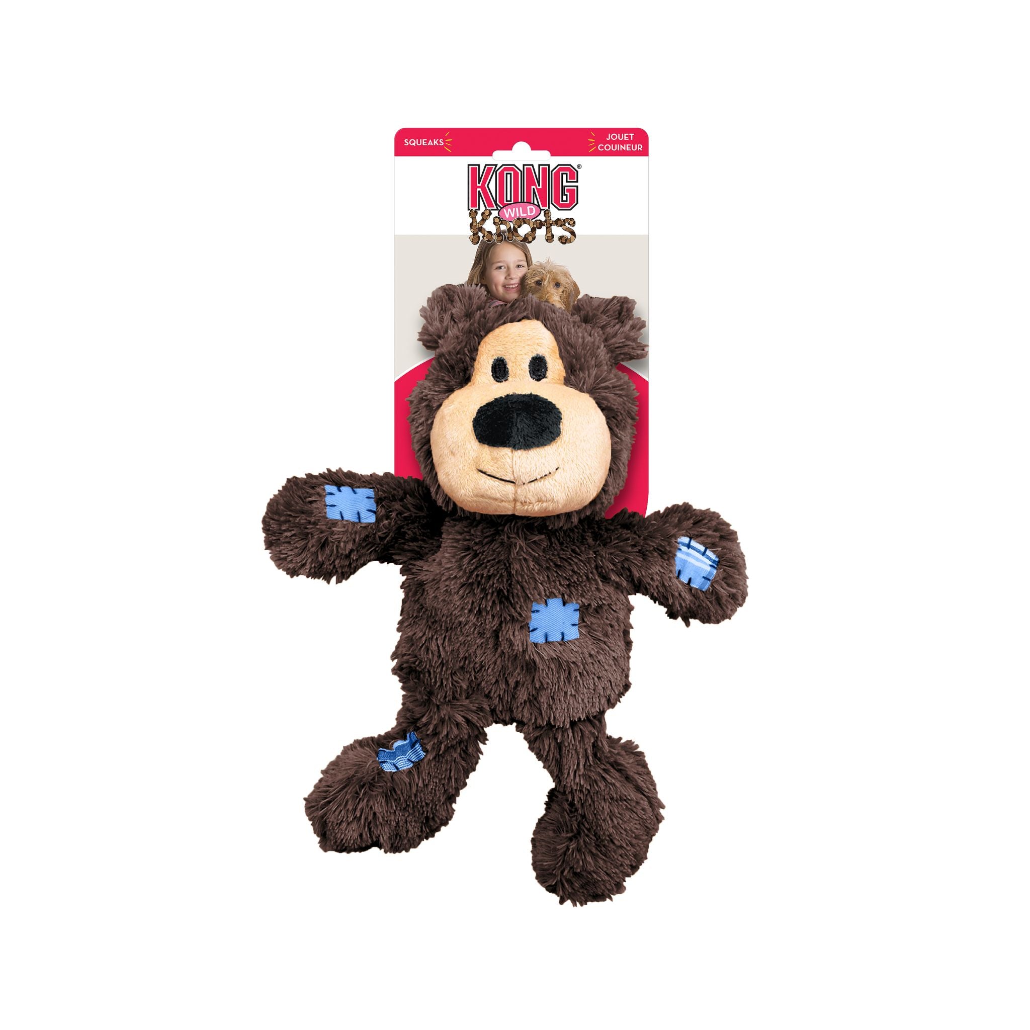 KONG Wild Knots Bear Dog Toy in Brown - Attached to branded packaging