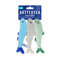 Blue, grey and green catnip fish cat toys attached to Battersea branded packaging.