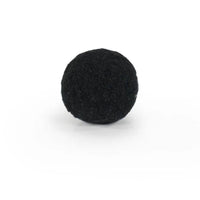 Close-up image of a black Battersea Pounce Cat Ball feline toy. 