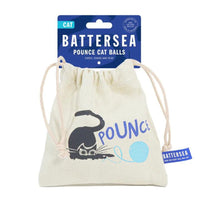 Reusable Battersea canvas storage bag featuring four soft pounce cat balls inside.