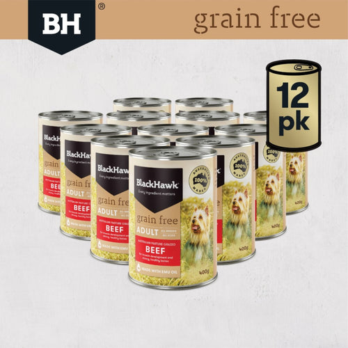12-pack of Black Hawk grain-free dog food cans on a light grey background
