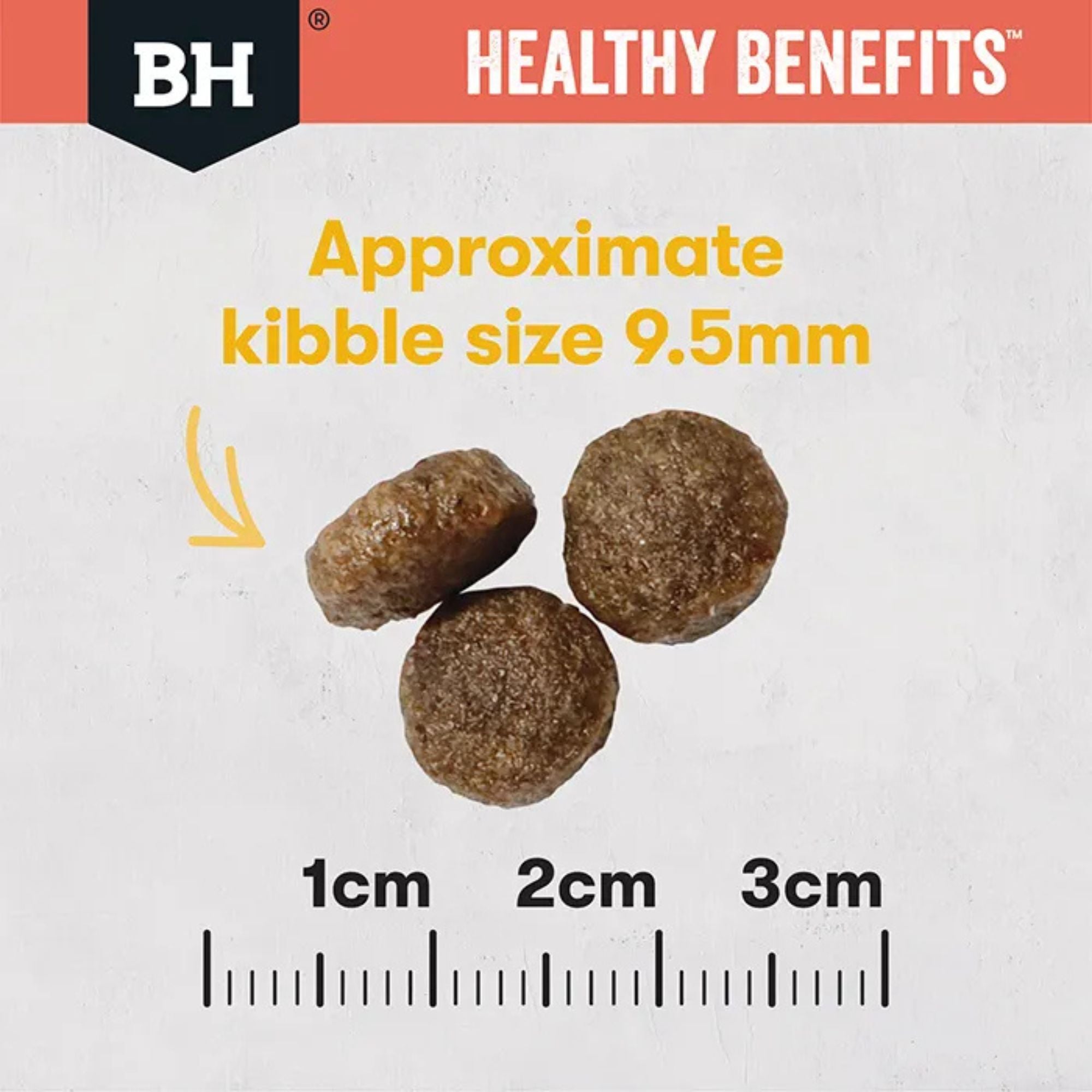 Black Hawk Healthy Benefits Indoor Cat kibble size comparison showing 9.5mm diameter against a metric ruler.