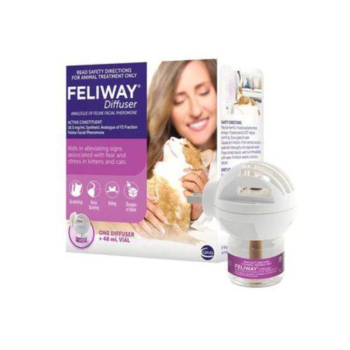 Feliway diffuser packaging with a woman holding a cat on a white background