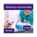 Veterinarian examining a cat with Feliway branding and 'Veterinary recommended' text.