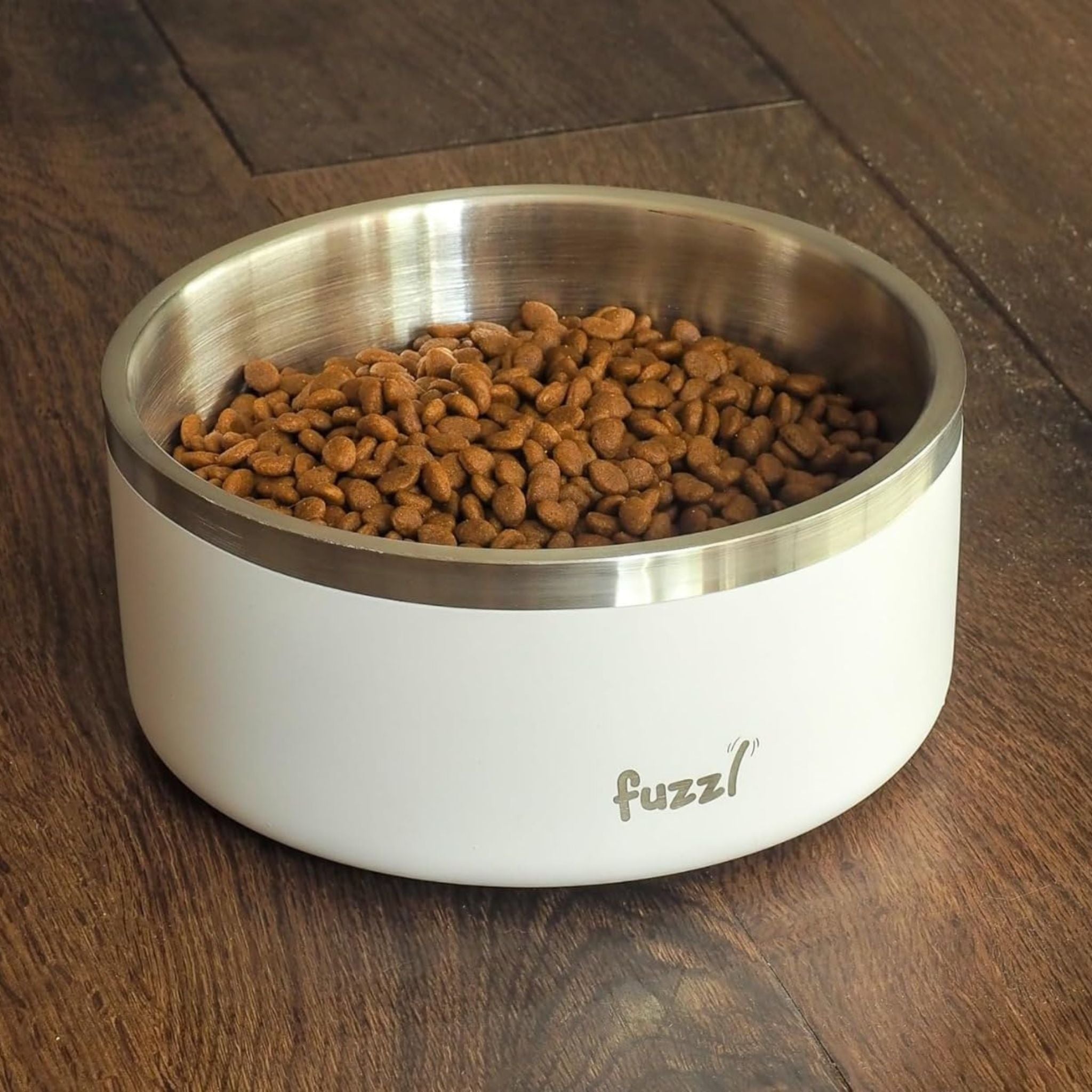 Fuzzl Titan Thermal Dog Bowl in Matt White filled with dry kibble.