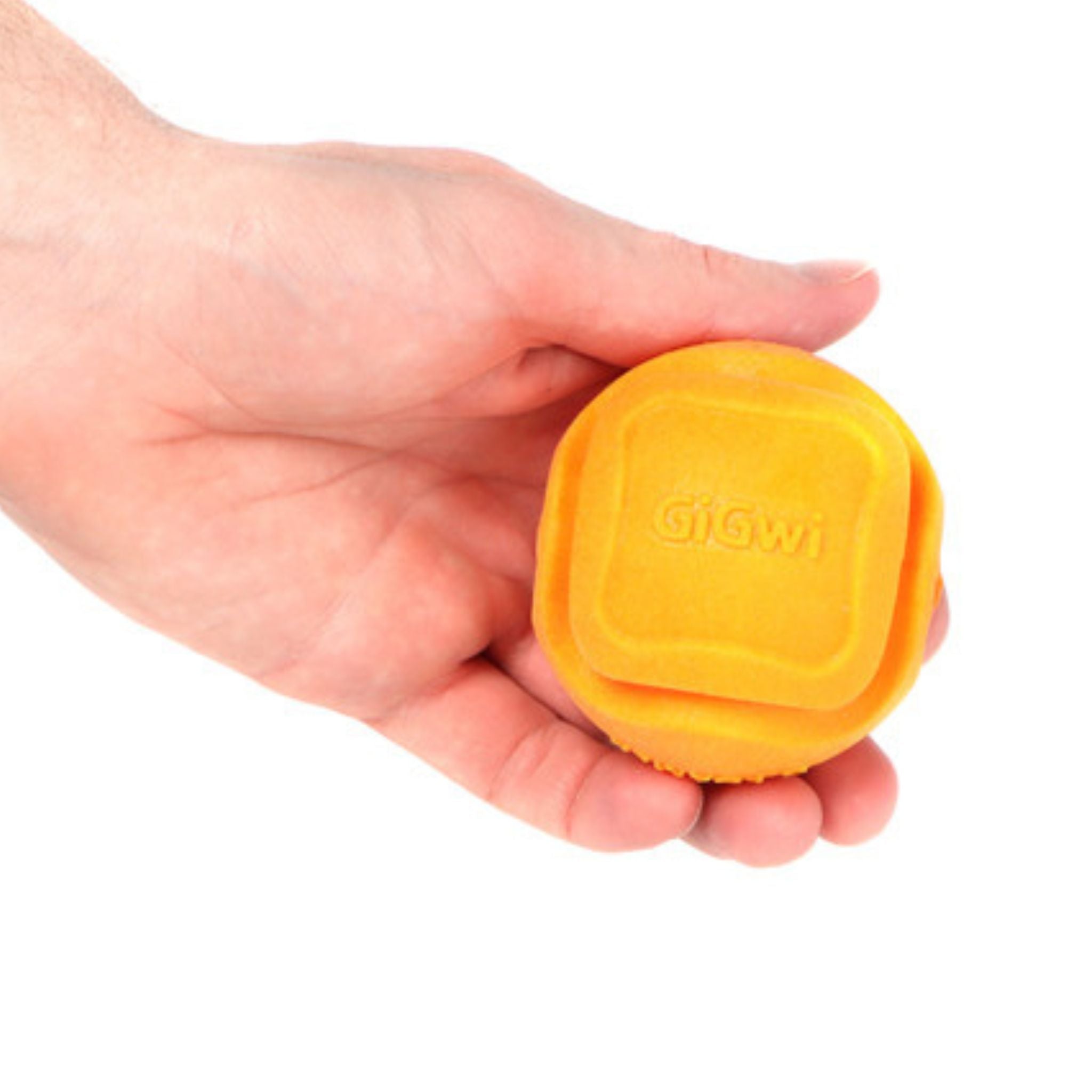 GiGwi G-Foamer Orange Ball in hand, showing its lightweight design and ideal size for interactive fetch games with dogs.