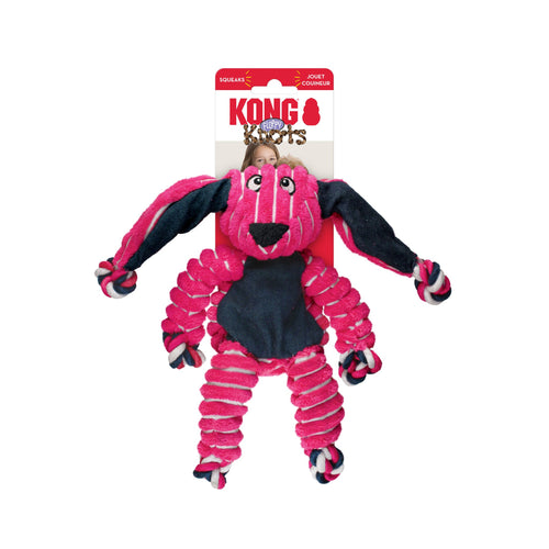 Pink and black floppy Knots Bunny dog toy with a KONG branded packaging. 
