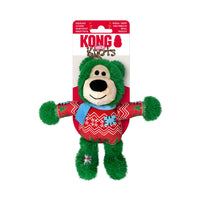 Green KONG Holiday Wild Knots Bear Dog Toy in festive sweater and scarf, shown in KONG branded packaging, perfect for holiday gifting.