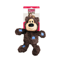 Plush brown bear dog toy attached to KONG Wild Knots branded packaging.