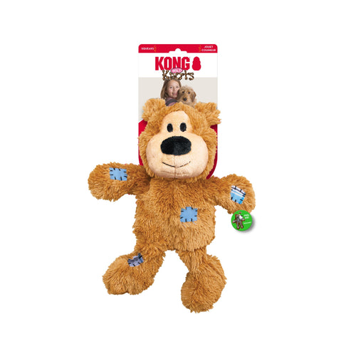KONG Wild Knots Bear Dog Toy in Tan - Attached to branded packaging