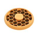 Outward Hound Catstages Cat Slow Feeder Bowl orange filled with dry food for cats.