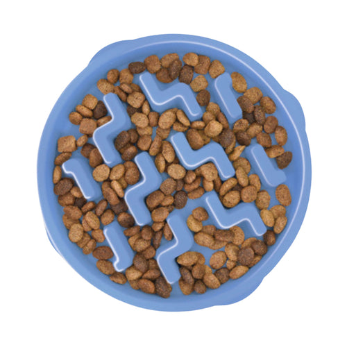 Blue Outward Hound maze-style slow feeder bowl with dry dog food inside on a white background.