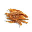 Close-up of fish fillet dog treats on a white background.