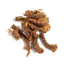 A close-up view of natural crunchy chicken neck treats for dogs ready to serve.