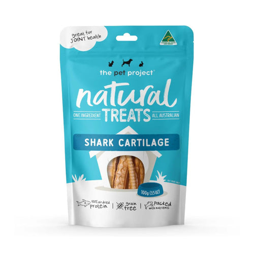 Close-up of front packaging for The Pet Project Natural Shark Cartilage Dog Treats with product branding.