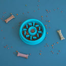 ZippyPaws Happy Bowl Donut slow feed bowl filled with kibble, styled with dog treats