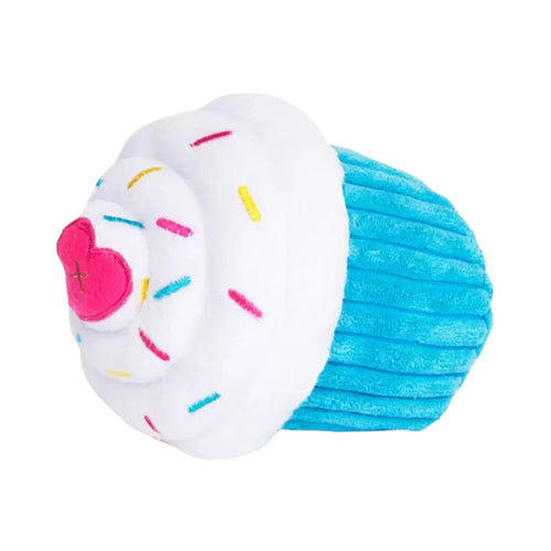 Side view of the blue NomNomz Cupcake plush toy showing the textured blue base and white frosting top with sprinkles.