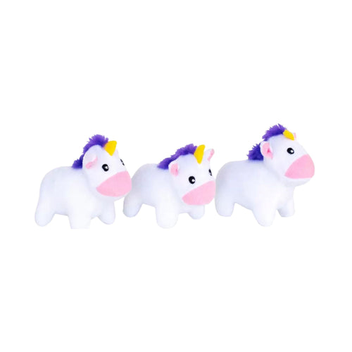 Three identical small, white plush unicorn Miniz dog toys lined up side-by-side against a plain background. Each toy features a colourful horn, a small pink mane, and embroidered facial details.